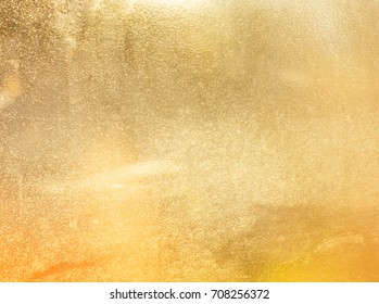 Shiny yellow leaf gold foil texture background - Shutterstock ID 708256372