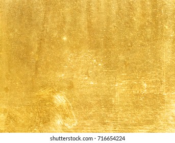 Shiny yellow leaf gold foil texture background - Shutterstock ID 716654224