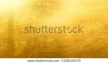 Shiny yellow leaf gold metall texture background