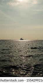 Ship Along The Horizon In Manila Bay