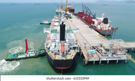 Ship Berthing Alongside The Jetty Terminal Of Port