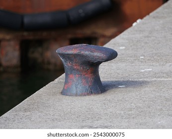 Ship bollard - solid - The rusty cast iron bollards are impressive witnesses to maritime history.