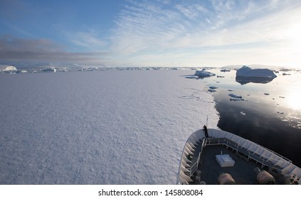 Ship Breaking Ice In Antarctica