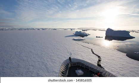 Ship Breaking Ice In Antarctica