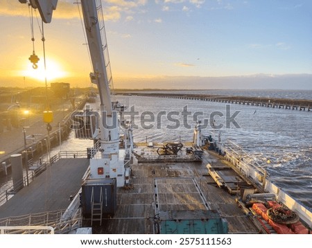 Ship bridge view rear loading and work deck with crane