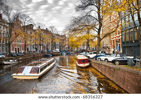 Similar – Image, Stock Photo Beautiful Architecture Of Dutch Houses and Houseboats On Amsterdam Canal In Autumn