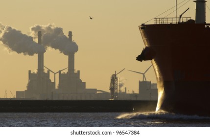 A Ship Entering The Port Of Rotterdam, Holland