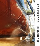 ship hull washing at drydock