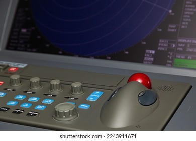 Ship navigation panel with radar computer and control buttons. - Powered by Shutterstock - Get 15% off with code: PIKWIZARD15