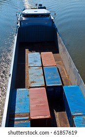 Ship On River Transports Container In Belly