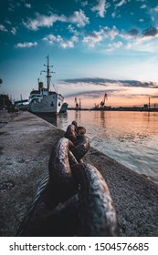 Ship In The Port Of Gothenburg In Sweden During Sunset