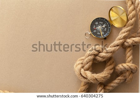 ship ropes and compass 