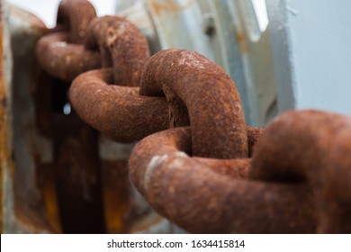 Ship Rusty Anchor Chain On A Winch.