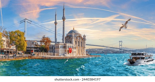 Ship is sailing near the Bosphorus bridge and Ortakoy Mosque, Istanbul, Turkey - Powered by Shutterstock