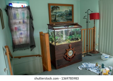 Ship Themed Fish Tank Getting A Water Change In A House In Sydney Australia In April 2019 