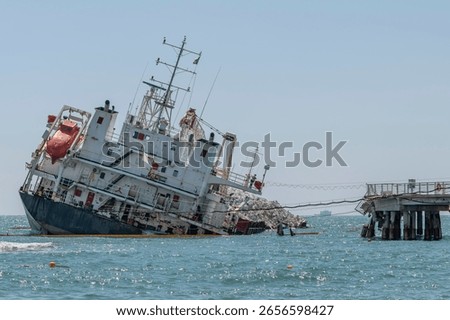 A ship tilts after hitting a dock, Marina di Massa, Italy