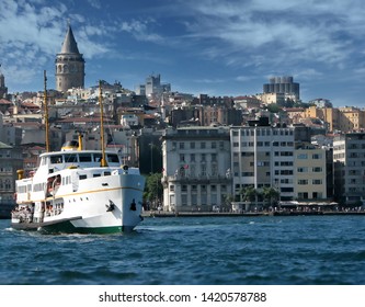 Ship transorting is very common way between europe and asia, istanbul. Galata Tower under the blue sky.