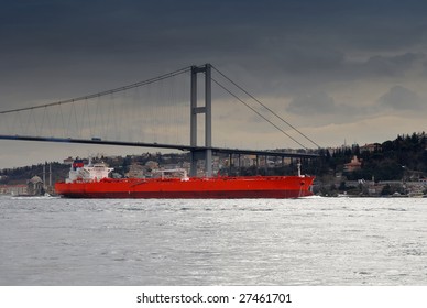 Ship Under Bosphorus Bridge Before The Storm