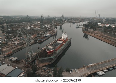 Ship under repair at the shipyard - Powered by Shutterstock