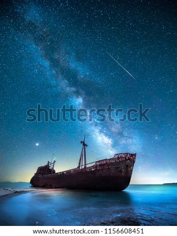 Ship wreck in the night in front of the milky way