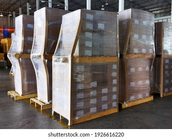 Shipment cartons box on pallets and wooden case on hand lift in interior warehouse cargo for export and sorting goods in freight logistics and transportation industrial, delivery service - Shutterstock ID 1926616220
