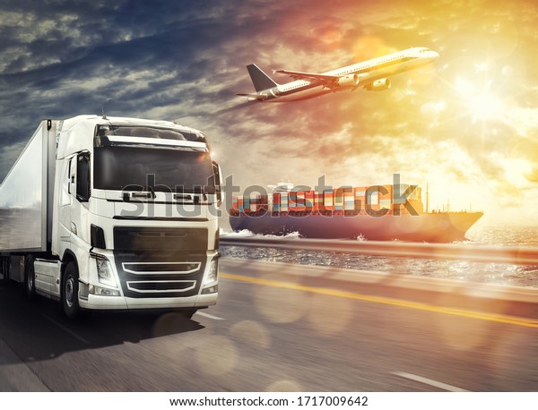Shipment of goods by sea, by land and\
by air with cargo ship, truck and airplane at\
sunset