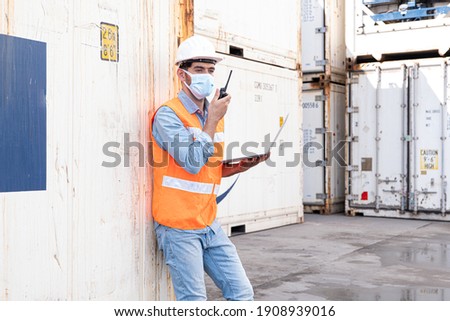 Shipping business background, worker is command working to set to loading many cargo container ship and airway bill around the world, business to make export and import, logistics transport background