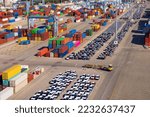 Shipping containers and imported new cars in port facilities,  Ashdod, Israel, Containers and cars before Loading In Ashdod Ports. Israel  - Aerial View