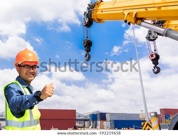 Shipping containers on\
cargo ship engineer.