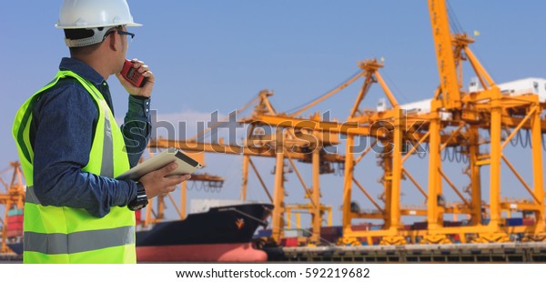Shipping containers on
cargo ship engineer.