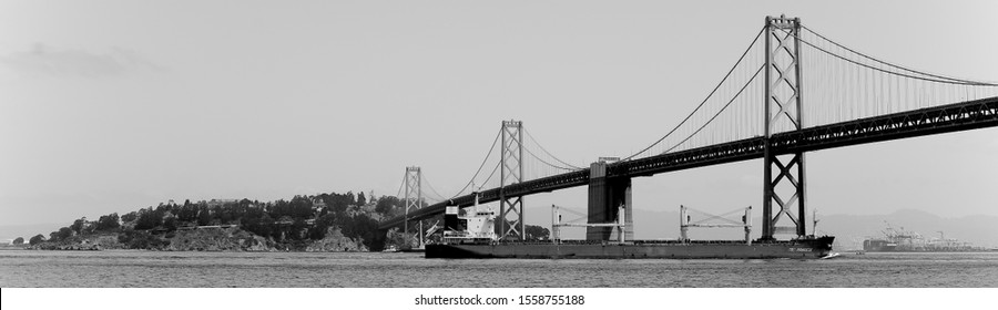A Shipping Passing Thru The SF Bay Bridge.        