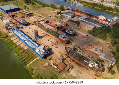 Ships And Boats In Dry Dock For Repairs. Aerial View.