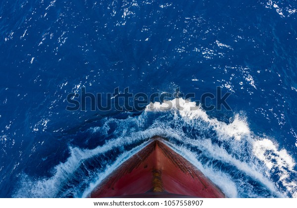 Ship's bow, moving through the waves to
her destination. View from forecastle
deck.