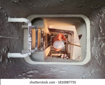 Ship's Crew Is Removing Cargo Residue In The Entrance Of Cargo Hold On Ship. 