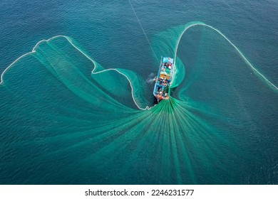 Ships and fishermen are fishing anchovies in Yen Island, Phu Yen, Vietnam - Powered by Shutterstock