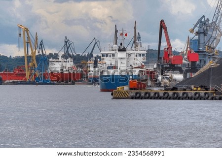 Ships gathered in the Port of Gdansk during unloading and loading. Port of Gdansk, Poland