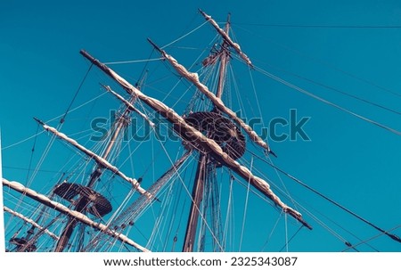 Ship's mast on blue sky