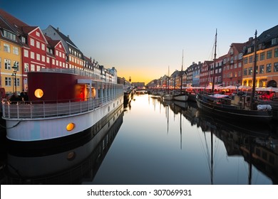 Ships in Nyhavn at sunset, Copenhagen, Denmark