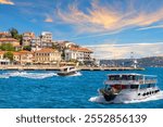 Ships are sailing near Bebek neighborhood on the bank of the Bosphorus Straight, Istanbul, Turkey