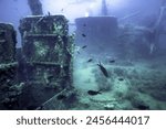 Shipwreck in the Blue Water, Rusty Shipwreck with Growing Corals, Underwater