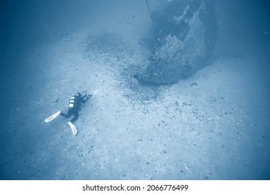 shipwreck diving landscape under water, old ship at the bottom, treasure hunt