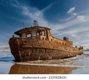 Shipwreck on the beach in the Namib desert