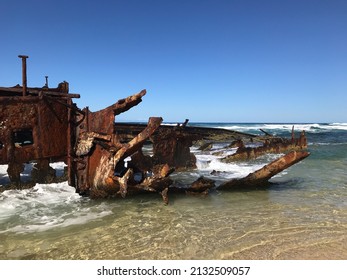 A Shipwreck On Fraser Island Beach In Eastern Australia