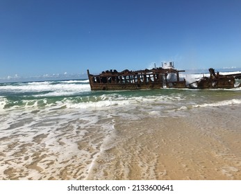 A Shipwreck On Fraser Island Beach In Eastern Australia