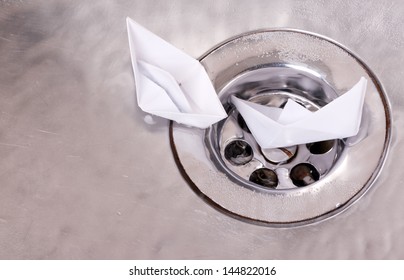 Shipwreck.Toy Paper Boat Sinks In The Sink