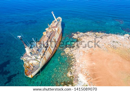 Shipwreck. The ship ran aground the top view. The ship crashed on the coastal cliffs. Abandoned marine vessels. The ship lies on the tank view from the drone.
