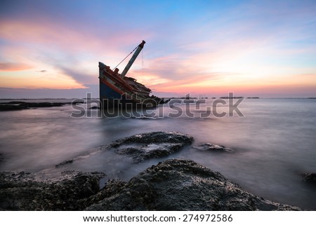 Shipwreck or wrecked boat on beach