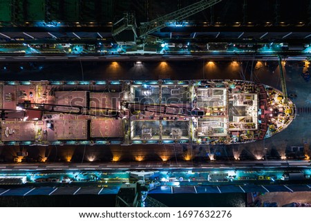 shipyard repair on the sea at night aerial top view