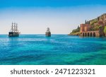 Shipyard and ship near Kizil Kule Red tower in Alanya, Antalya, Turkey