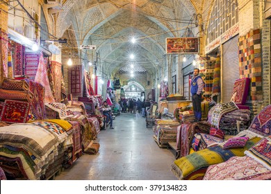 Shiraz, Iran - December 24, 2015: Traditional iranian carpets shop in Vakil Bazaar, Shiraz, Iran. Vakil Bazaar is the most important tourist attraction in Shiraz, Iran.